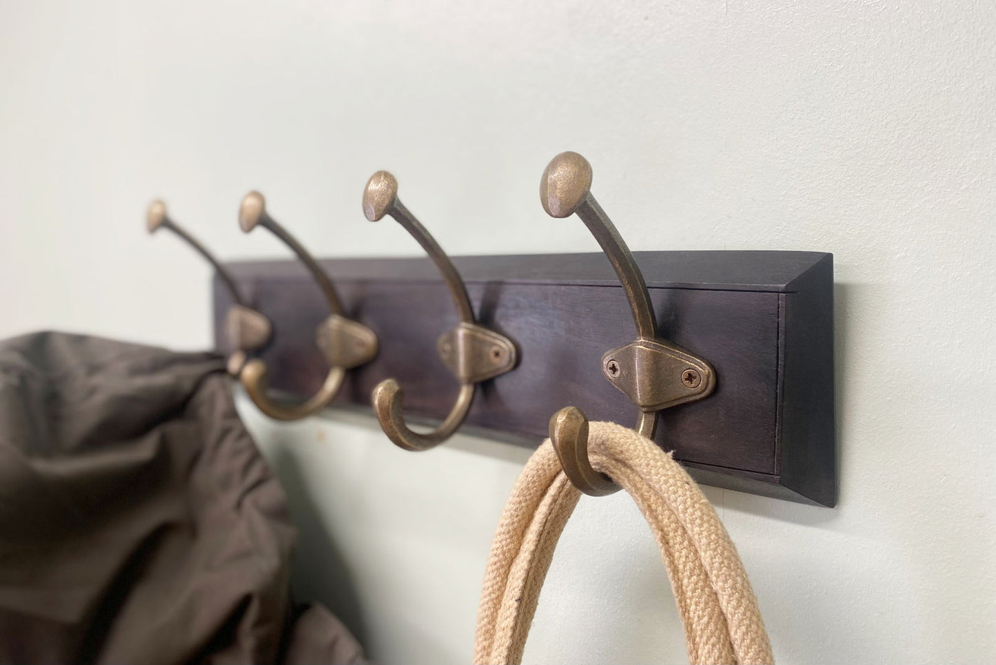 Wooden Base With 4 Brass Coat Hooks