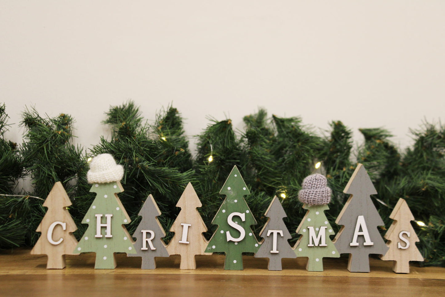 Row of Christmas Trees Decoration With Hats Green